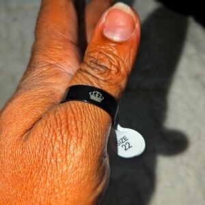 Mens ring with crown etched on it